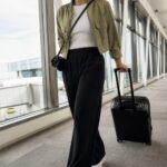 Woman wearing stretch ponte wide-leg pants for a polished travel outfit