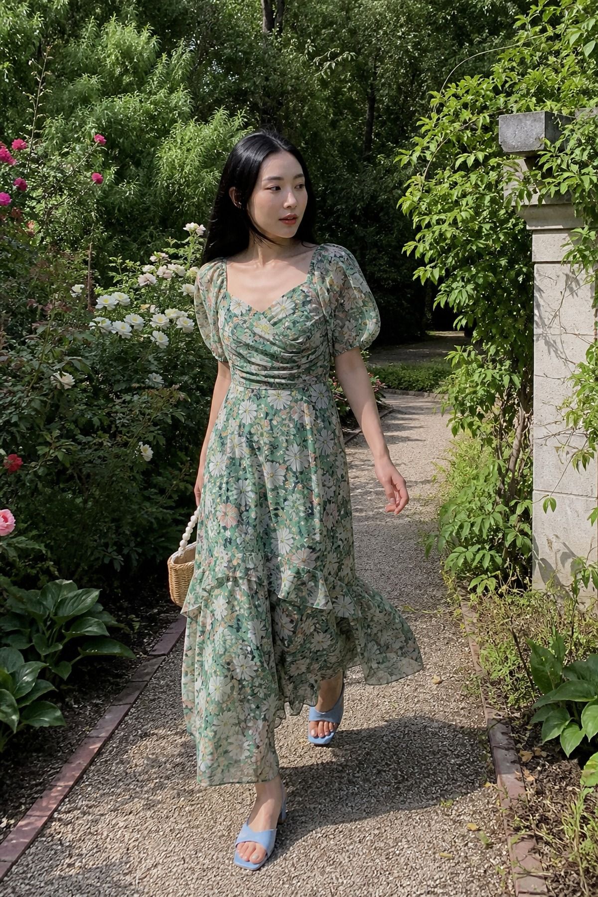 Woman wearing a garden party floral maxi with low heels, a bridal shower guest outfit