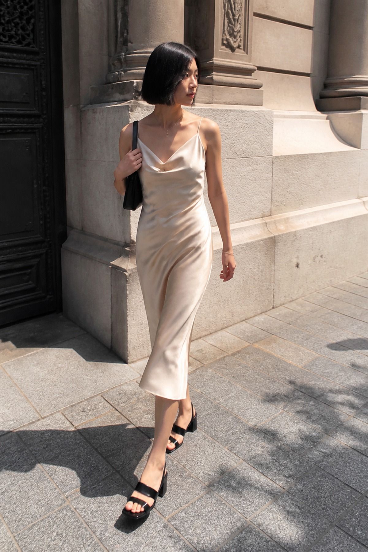 satin slip midi with block-heel sandals casual wedding guest outfit
