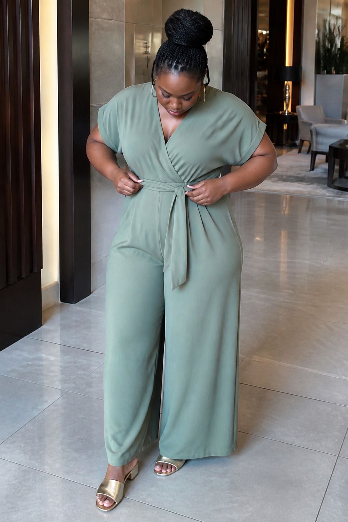 jumpsuit with a wide leg and soft waist tie casual wedding guest outfit