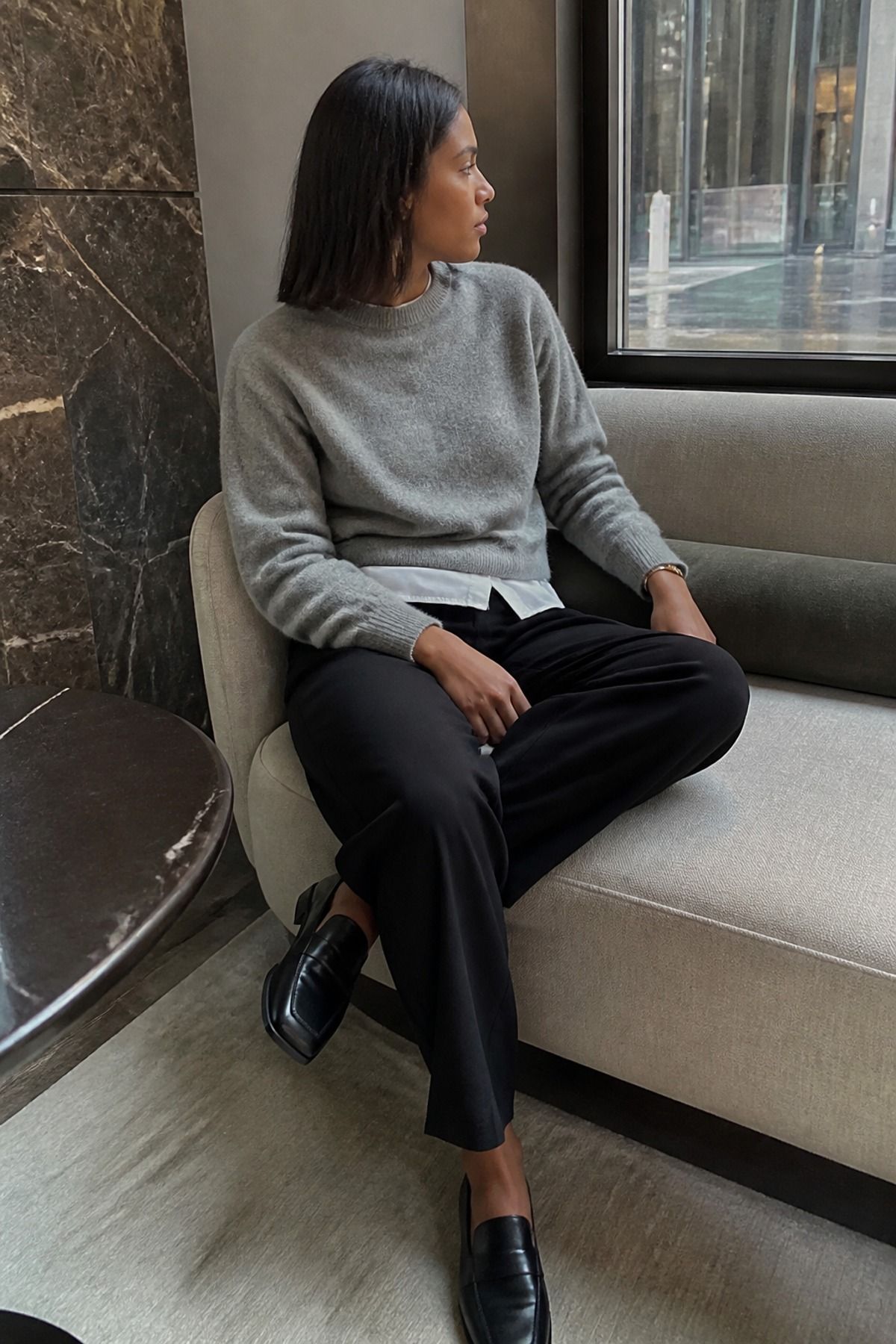Woman wearing a cashmere crewneck sweater