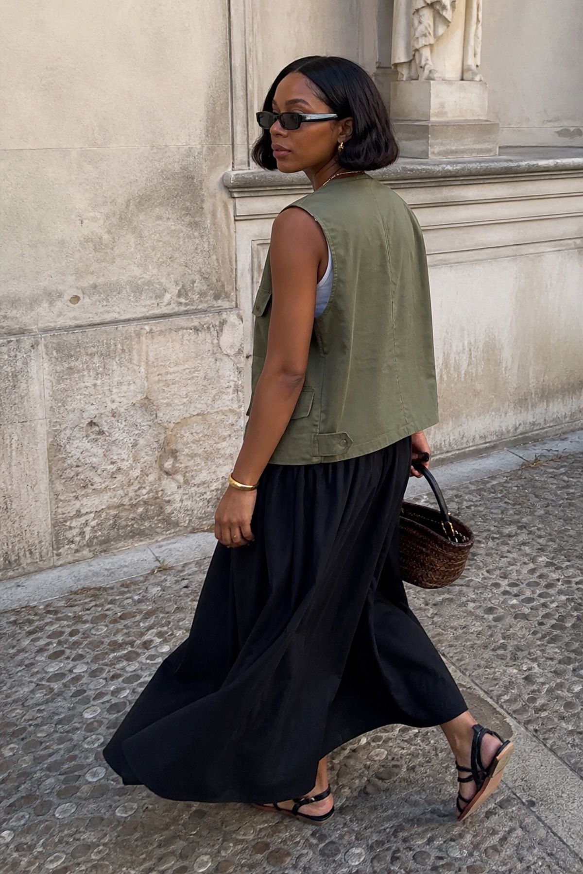 Woman wearing a maxi skirt with a utility vest, a Target outfit