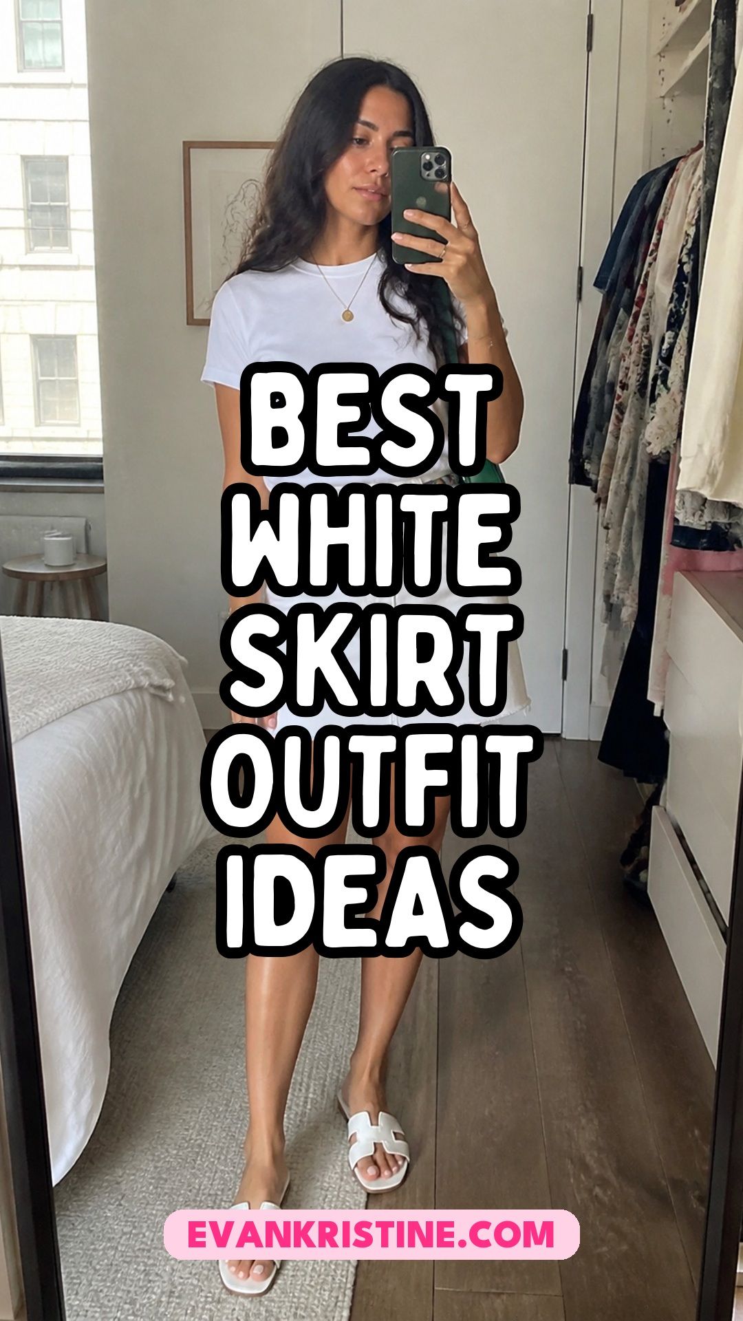 Woman in a white midi skirt with a denim jacket and white sneakers